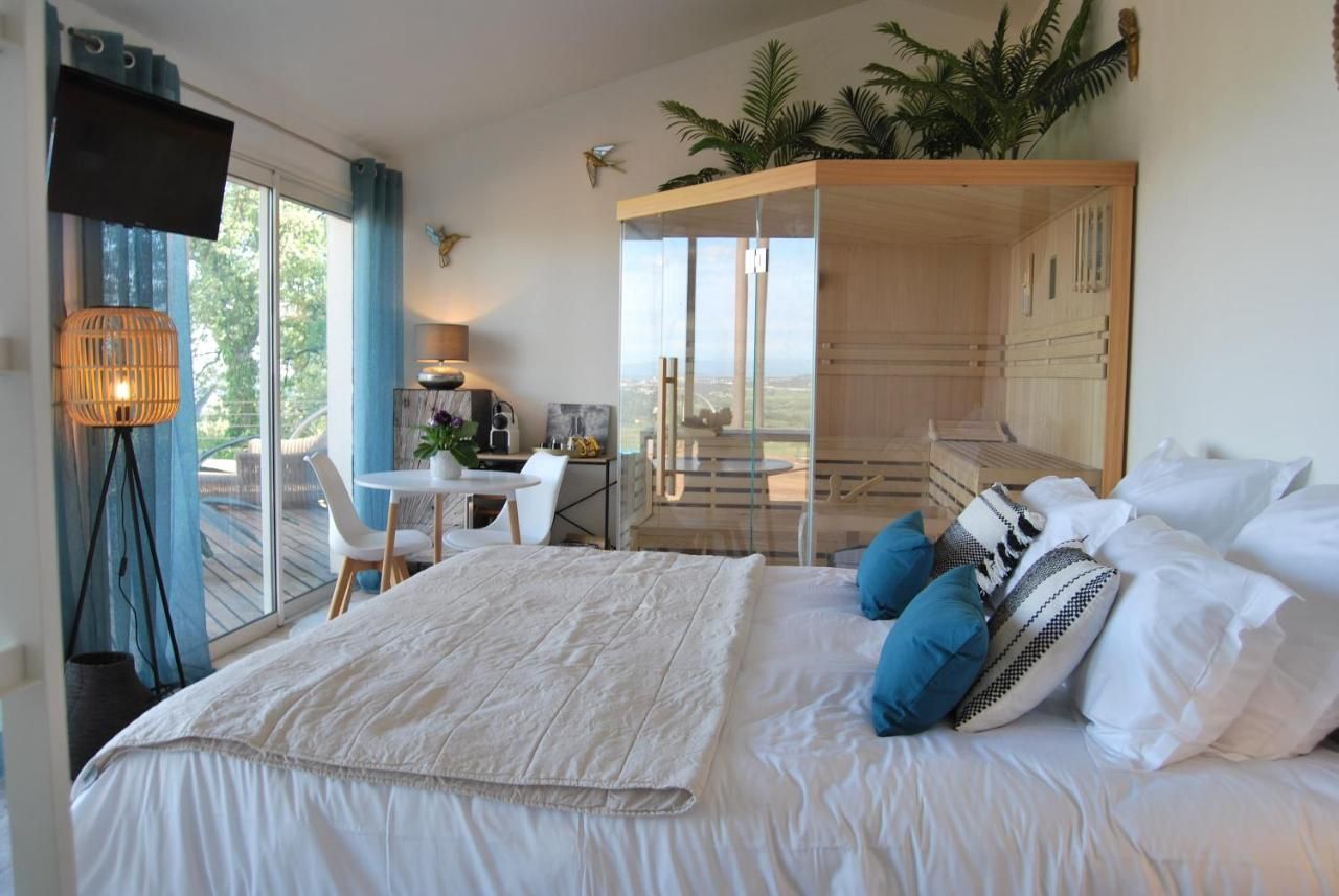 Chamnre avec Lit King Size et sauna privatif Chamnre avec Lit King Size et sauna privatif